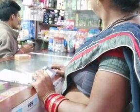 Sexy aunty on medical shop in saree