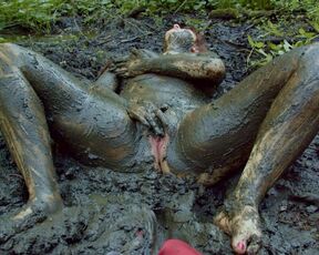 Red Riding hood masturbates in forest mud