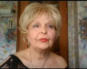 Elegant elderly lady shows herself on Skype