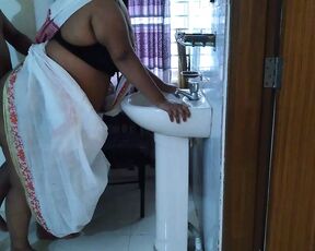 Naked Student came and fucked Indian college female teacher while fixing saree in washroom - huge ass fuck