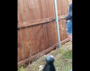 MILF Stand up Pisses thru Zipper on Neighbor's Fence while he Mows his Yard